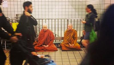 Meditating in a New York subway station. Photos courtesy of Buddhist Insights Meditating in a New York subway station. Photos courtesy of Buddhist Insights